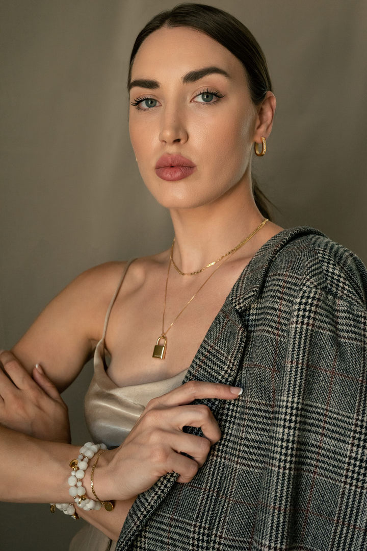 gold-oval-hoop-earrings-Jessica-Santander