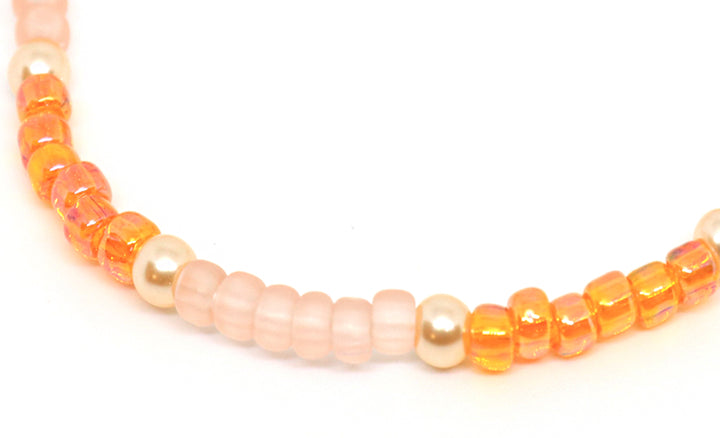 snow-quartz-tear-drop-orange-seed-beads-bracelet-online-handmade
