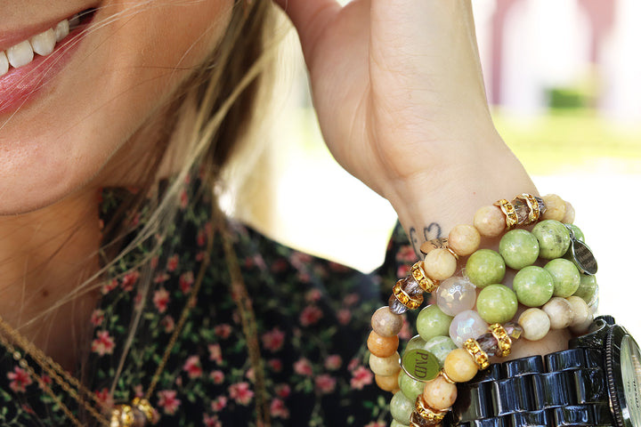 Olivine green-gemstone-bracelet-silver-charm